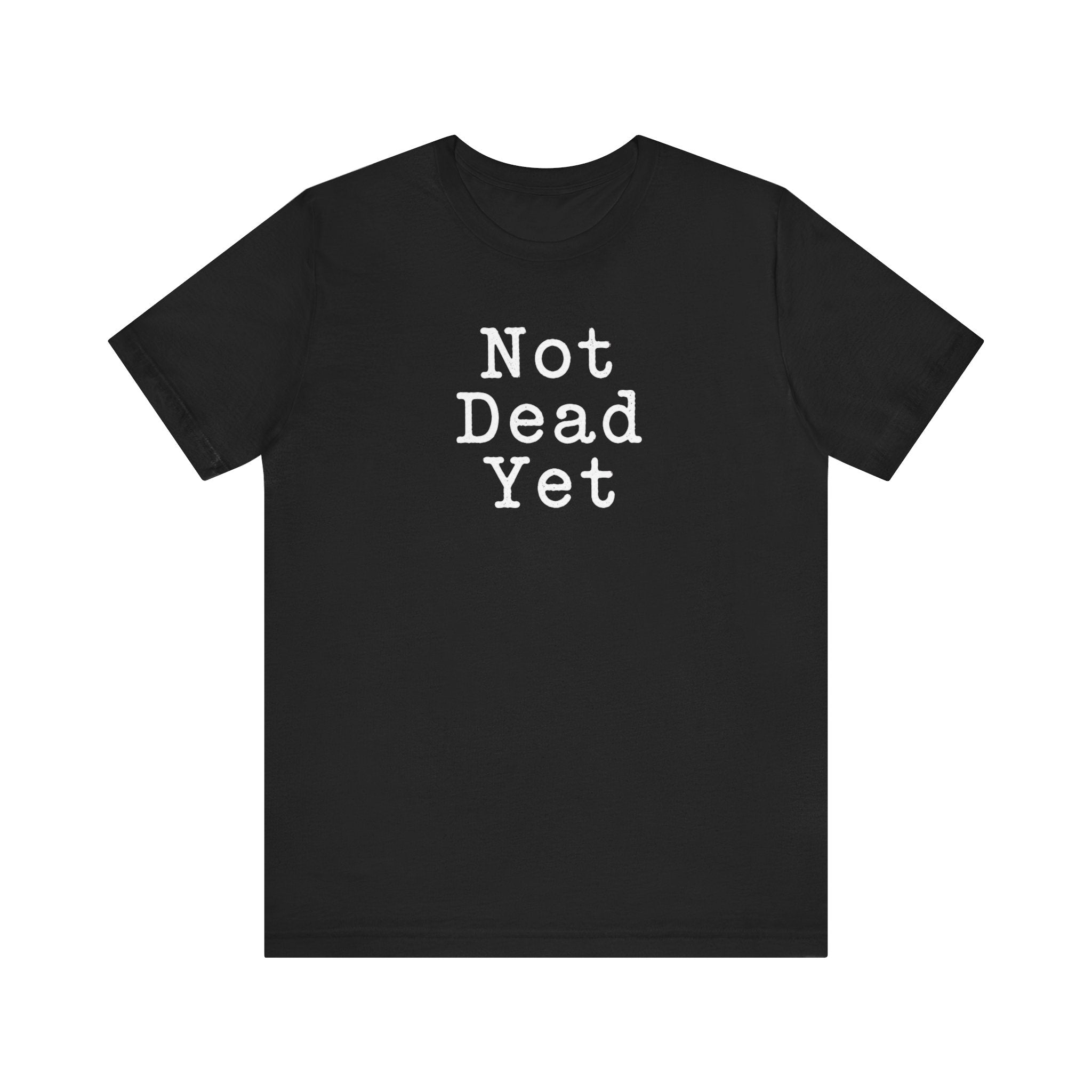 Not Dead Yet sarcastic minimalist humor unisex t-shirt, dark comedy bold text on black tee